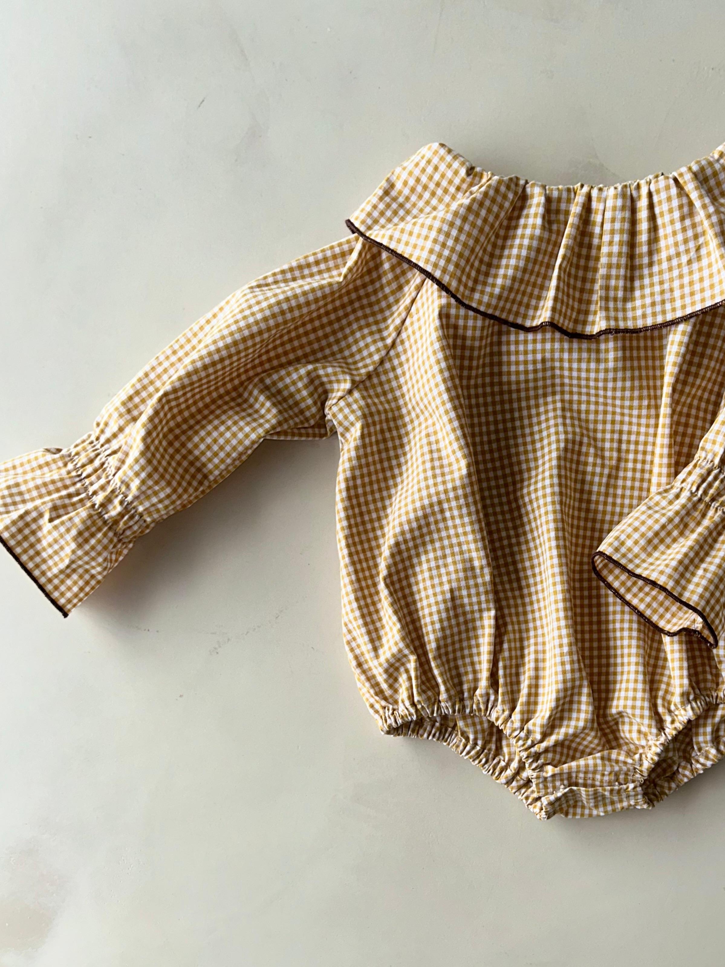 Marco's romper in Honey