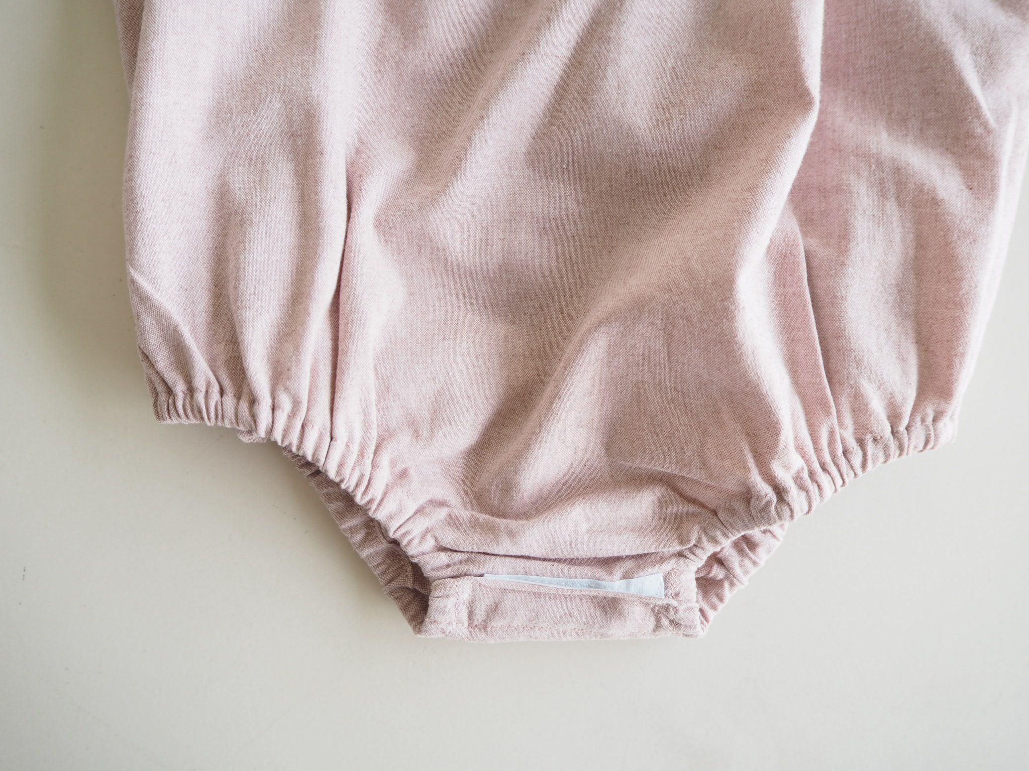 Marco's romper in Rose