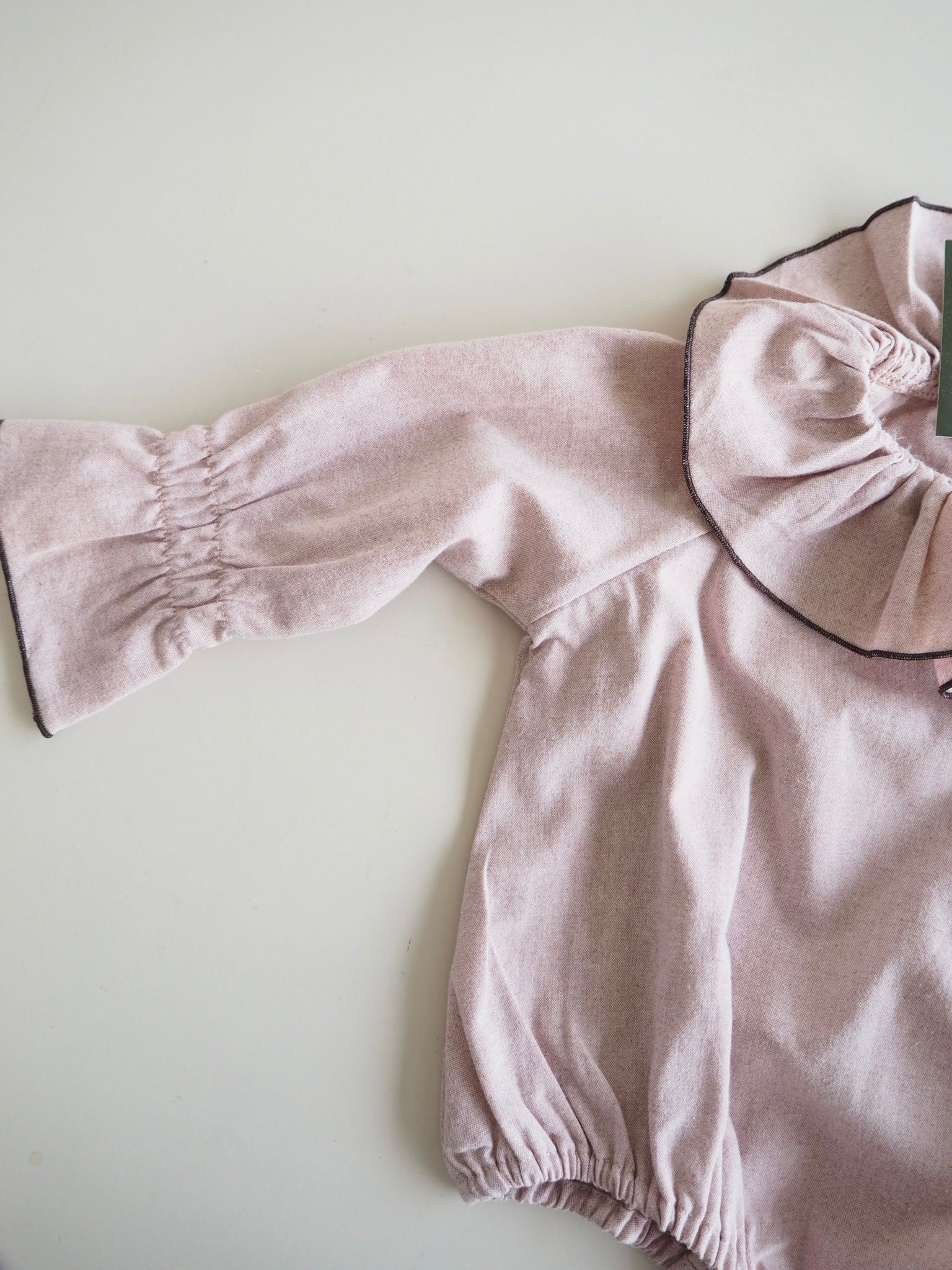 Marco's romper in Rose