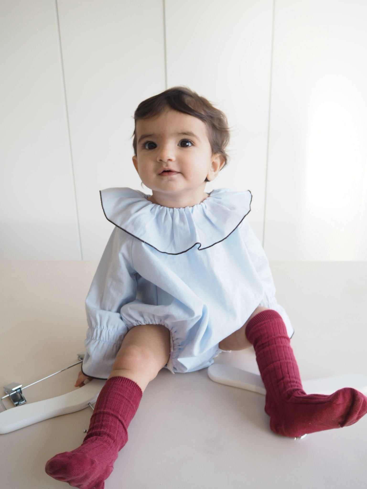 Marco's romper in Celeste